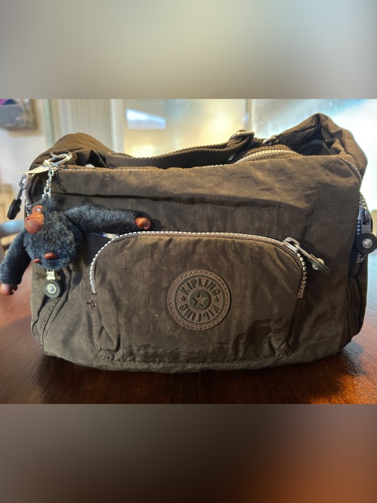 Kipling Handbags - Kipling Chocolate Brown Crossbody Bag with signature Monkey Keychain